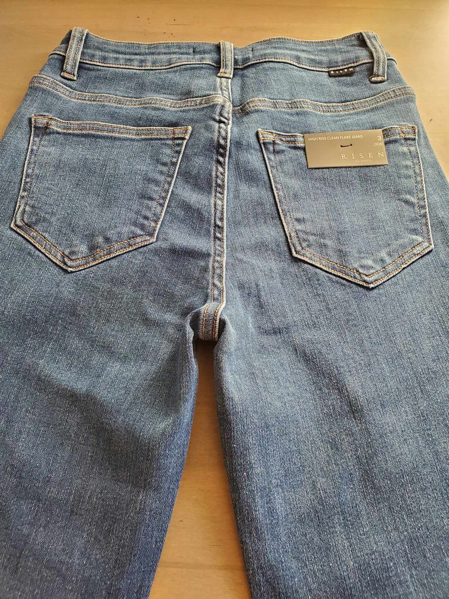 Risen High Rise Clean Flare Jeans