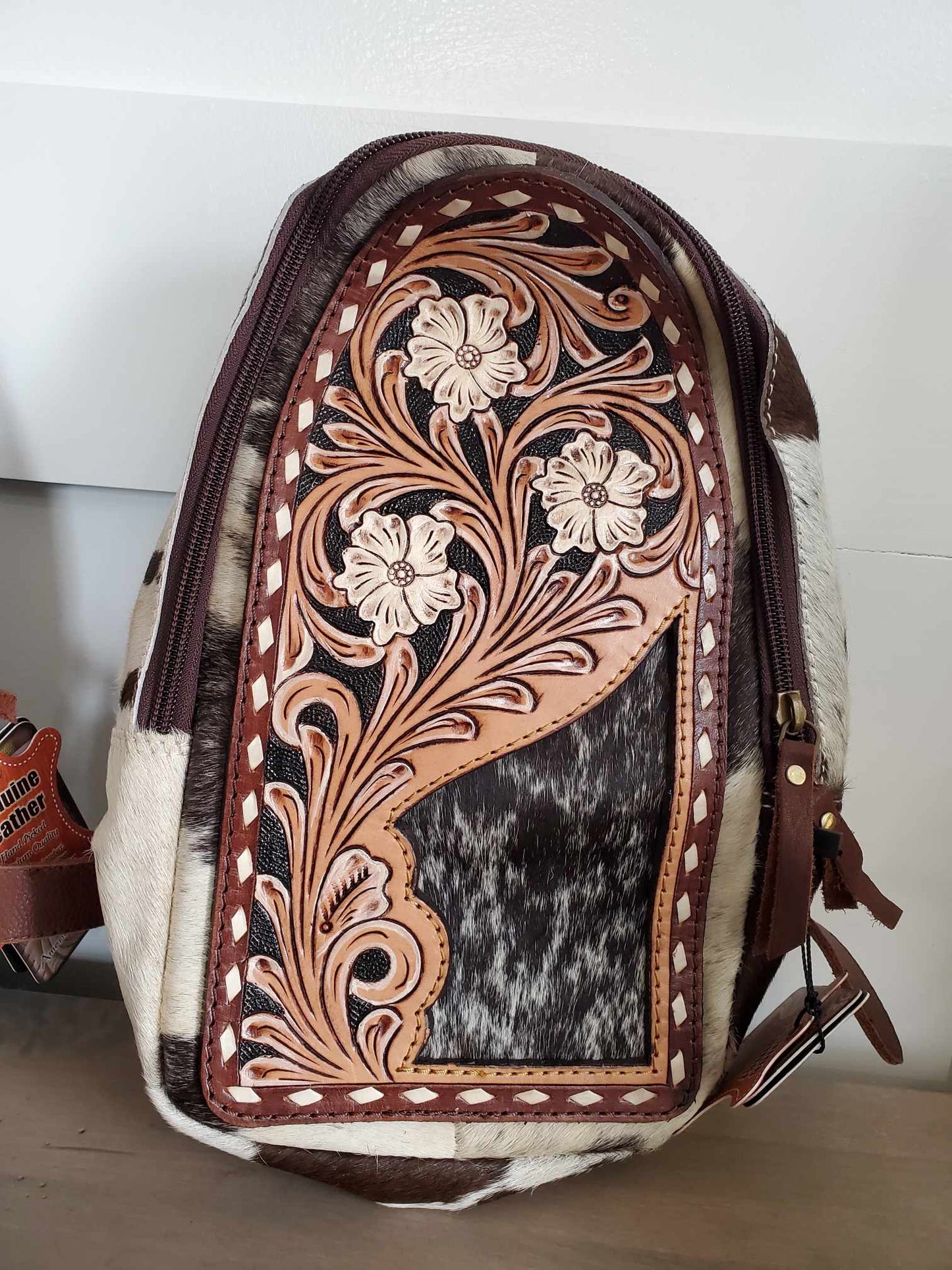 Hand Tooled Hair On Hide Sling Bag